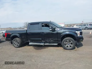 2020 Ford F-150 XL z VIN 1FTFW1E57LFC70041, wystawiony jako IAAI lot #41773623 z przebiegiem 30 860 mil mil oraz . Historia ofert i sprzedaży dostępna na DreamBid. Obrazek 13.