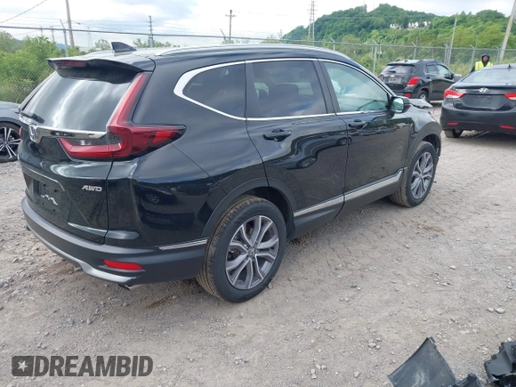 2021 Honda CR-V Touring with VIN 5J6RW2H92ML003064, listed as a IAAI auction lot 42298361 with 70,988 mi miles and . Bid and sale history available at DreamBid. Image 4.
