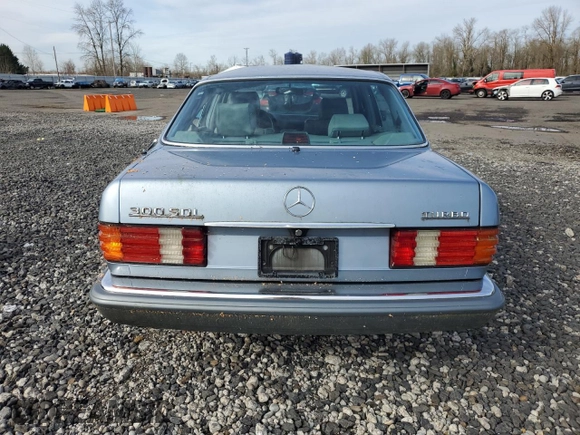 1986 Mercedes-Benz 300 with VIN WDBCB25D9GA279756, listed as a Copart auction lot 46860345 with 210,386 mi miles and Salvage Title. Bid and sale history available at carsss.com. Image 6.