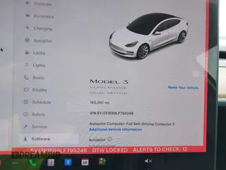 2020 Tesla Model 3 Long Range with VIN 5YJ3E1EB9LF795246, listed as a IAAI auction lot 41895750 with 163,061 mi miles and . Bid and sale history available at DreamBid. Image 7.