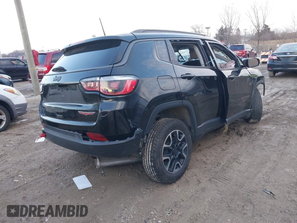 2019 Jeep Compass Trailhawk with VIN 3C4NJDDB0KT671633, listed as a IAAI auction lot 38411581 with Not Provided miles and . Bid and sale history available at carsss.com. Image 4.