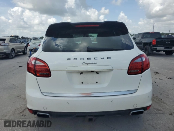 2012 Porsche Cayenne with VIN WP1AA2A23CLA02615, listed as a Copart auction lot 64604655 with 131,536 mi miles and Salvage title. Bid and sale history available at DreamBid. Image 6.