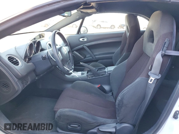 2012 Mitsubishi Eclipse GT with VIN 4A37L3ET5CE002857, listed as a Copart auction lot 48827535 with 97,772 mi miles and Salvage Title. Bid and sale history available at carsss.com. Image 7.