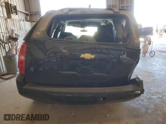 2013 Chevrolet Tahoe Commercial with VIN 1GNLC2E01DR190568, listed as a Copart auction lot 49525875 with 87,872 mi miles and Salvage title. Bid and sale history available at DreamBid. Image 6.