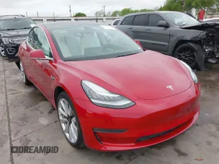 2018 Tesla Model 3 Long Range Battery with VIN 5YJ3E1EB7JF100761, listed as a IAAI auction lot 41879524 with 81,425 mi miles and . Bid and sale history available at DreamBid. Image 1.