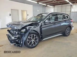 2021 BMW X1 xDrive28i with VIN WBXJG9C00M5S35249, listed as a Copart auction lot 61895775 with 34,641 mi miles and Salvage title. Bid and sale history available at DreamBid. Image 1.