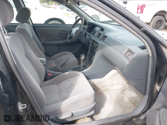 2001 Toyota Camry CE with VIN JT2BG22K910548345, listed as a IAAI auction lot 41723835 with 170,228 mi miles and . Bid and sale history available at DreamBid. Image 5.