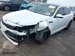 2016 Kia Optima SXL Turbo with VIN 5XXGV4L2XGG093431, listed as a IAAI auction lot 41460826 with 154,154 mi miles. Bid and sale history available at carsss.com. Image 2.