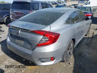 2019 Honda Civic Sport with VIN 19XFC2F88KE034868, listed as a IAAI auction lot 41913004 with 60,599 mi miles and . Bid and sale history available at DreamBid. Image 4.