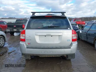 2010 Jeep Compass Sport with VIN 1J4NF4FB3AD589361, listed as a IAAI auction lot 41449412 with 127,807 mi miles. Bid and sale history available at carsss.com. Image 15.