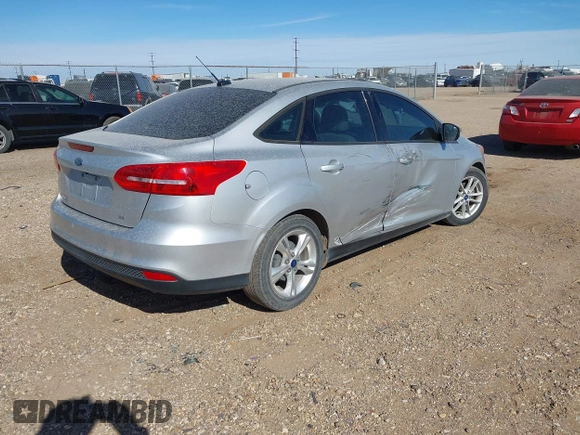 2017 Ford Focus SE with VIN 1FADP3F29HL263353, listed as a IAAI auction lot 41945763 with 116,866 mi miles and . Bid and sale history available at DreamBid. Image 4.