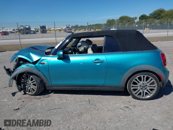 2016 MINI Convertible z VIN WMWWG5C5XG3A83276, wystawiony jako IAAI lot #41864830 z przebiegiem 103 721 mil mil oraz . Historia ofert i sprzedaży dostępna na DreamBid. Obrazek 14.