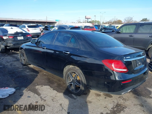 2018 Mercedes-Benz E-Class E 300 with VIN WDDZF4JB0JA299018, listed as a IAAI auction lot 41364406 with 89,697 mi miles. Bid and sale history available at carsss.com. Image 3.