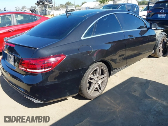 2016 Mercedes-Benz E 400 with VIN WDDKJ6FB3GF320475, listed as a IAAI auction lot 42324564 with 132,182 mi miles and . Bid and sale history available at DreamBid. Image 4.