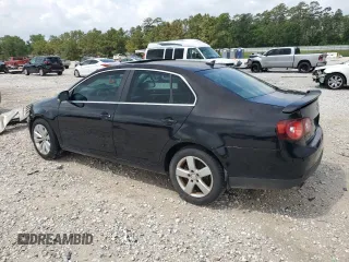 2009 Volkswagen Jetta SE z VIN 3VWRM71K49M055000, wystawiony jako Copart lot #54450045 z przebiegiem 163 451 mil mil oraz Szkoda całkowita • Salvage title. Historia ofert i sprzedaży dostępna na DreamBid. Obrazek 2.