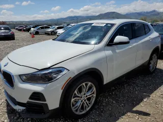 2022 BMW X2 xDrive28i z VIN WBXYJ1C00N5U17584, wystawiony jako Copart lot #55994955 z przebiegiem 21 973 mil mil oraz Czysty tytuł • Clean title. Historia ofert i sprzedaży dostępna na DreamBid. Obrazek 1.
