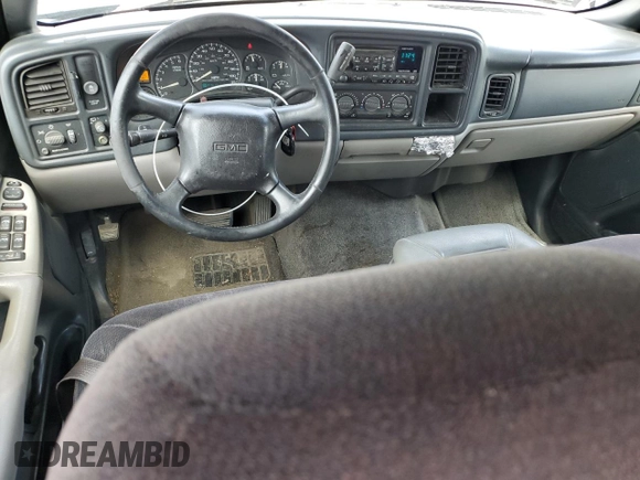 2002 GMC Yukon SLE z VIN 1GKEC13Z22R152796, wystawiony jako Copart lot #55330344 z przebiegiem 337 318 mil mil oraz Szkoda całkowita • Salvage title. Historia ofert i sprzedaży dostępna na DreamBid. Obrazek 8.
