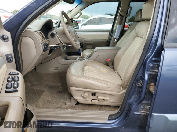 2002 Mercury Mountaineer z VIN 4M2ZU86E62ZJ06894, wystawiony jako Copart lot #56680624 z przebiegiem 200 718 mil mil oraz Nie do naprawy. Historia ofert i sprzedaży dostępna na DreamBid. Obrazek 7.