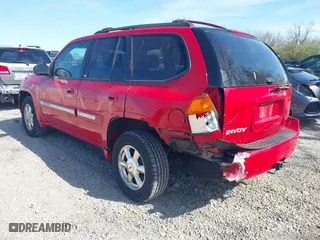2002 GMC Envoy SLT with VIN 1GKDT13S322512505, listed as a IAAI auction lot 42056266 with 139,793 mi miles. Bid and sale history available at carsss.com. Image 3.