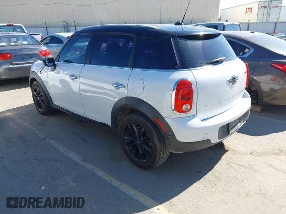 2015 MINI Countryman with VIN WMWZB3C51FWR45357, listed as a IAAI auction lot 41871831 with 201,358 mi miles and . Bid and sale history available at DreamBid. Image 3.