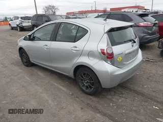 2014 Toyota Prius One with VIN JTDKDTB35E1557798, listed as a IAAI auction lot 41753972 with 182,543 mi miles and . Bid and sale history available at DreamBid. Image 3.