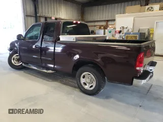 2000 Ford F-150 XL with VIN 1FTZX1726YKB41994, listed as a Copart auction lot 69300034 with Not provided miles and Salvage title. Bid and sale history available at DreamBid. Image 2.