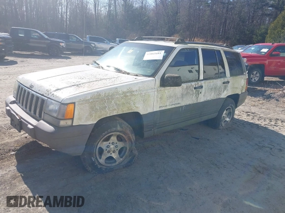 1996 Jeep Grand Cherokee Laredo with VIN 1J4GZ58Y7TC381600, listed as a IAAI auction lot 42065681 with Not provided miles and . Bid and sale history available at DreamBid. Image 2.