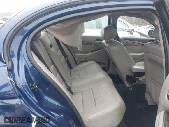 2002 Jaguar S-Type with VIN SAJDA03NX2FM32537, listed as a IAAI auction lot 40774935 with Not Provided miles and . Bid and sale history available at DreamBid. Image 8.