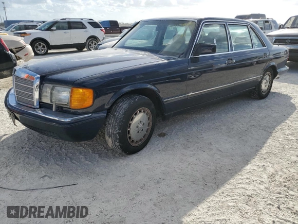 1986 Mercedes-Benz 560 with VIN WDBCA39D0GA268955, listed as a Copart auction lot 77190964 with 99,702 mi miles and Non Repairable. Bid and sale history available at DreamBid. Image 1.