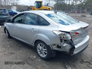 2017 Ford Focus SE with VIN 1FADP3F25HL335102, listed as a IAAI auction lot 42010697 with 77,389 mi miles. Bid and sale history available at carsss.com. Image 3.