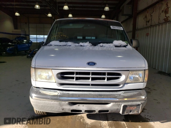 1999 Ford Econoline Passenger XL with VIN 1FBSS31L0XHB37226, listed as a Copart auction lot 46419355 with 51,209 mi miles and Clean Title. Bid and sale history available at DreamBid. Image 5.