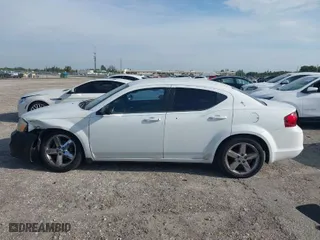 2012 Dodge Avenger SE with VIN 1C3CDZABXCN151302, listed as a IAAI auction lot 41986787 with 135,224 mi miles. Bid and sale history available at carsss.com. Image 14.