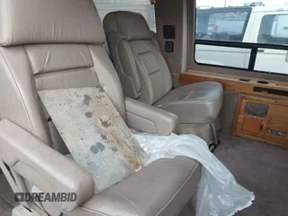 1996 Ford Econoline Cargo z VIN 1FDEE14H2THB68737, wystawiony jako IAAI lot #41919471 z przebiegiem Nie podano mil oraz . Historia ofert i sprzedaży dostępna na DreamBid. Obrazek 8.