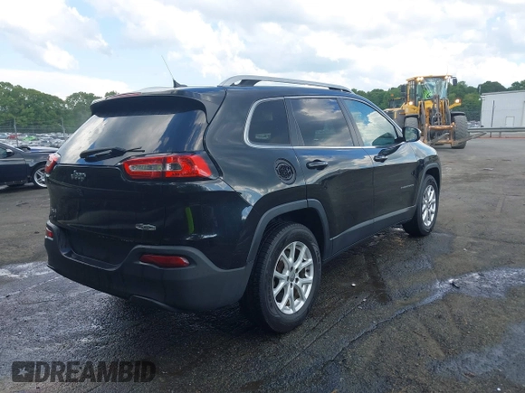 2015 Jeep Cherokee Latitude z VIN 1C4PJMCB4FW648897, wystawiony jako IAAI lot #42182493 z przebiegiem 129 457 mil mil oraz . Historia ofert i sprzedaży dostępna na DreamBid. Obrazek 4.