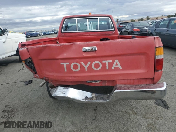 1990 Toyota Pickup DX с VIN JT4RN81P1L5069080, выставлен на аукционе Copart как лот 81606084 с пробегом 168 115 миль миль и Списание • Salvage title. История ставок и продаж доступна на DreamBid. Изображение 6.