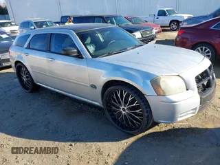 2007 Dodge Magnum with VIN 2D4FV47T97H776414, listed as a IAAI auction lot 41450710 with 242,006 mi miles and . Bid and sale history available at carsss.com. Image 1.