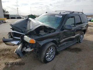 2005 GMC Yukon SLT with VIN 1GKEC13T25R129504, listed as a Copart auction lot 50785955 with 0 mi miles and Salvage Title. Bid and sale history available at carsss.com. Image 1.