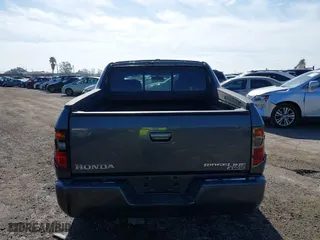 2007 Honda Ridgeline RTL w/Leather with VIN 2HJYK16537H523732, listed as a IAAI auction lot 41798931 with 219,881 mi miles. Bid and sale history available at carsss.com. Image 16.