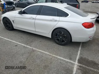2015 BMW 4 Series 428i xDrive with VIN WBA4C9C59FD331372, listed as a Copart auction lot 58628665 with 81,245 mi miles and Salvage title. Bid and sale history available at DreamBid. Image 2.