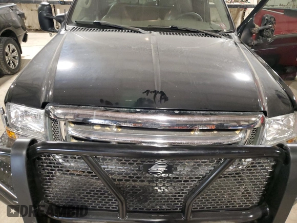 2001 Ford F-350 with VIN 1A040185, listed as a Copart auction lot 87953295 with 212,487 mi miles and Salvage title. Bid and sale history available at DreamBid. Image 11.