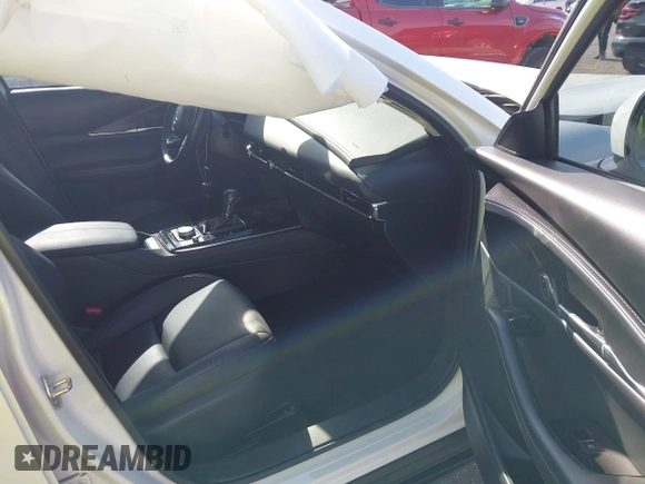 2023 Mazda CX-30 S Carbon Edition with VIN 3MVDMBCM2PM552282, listed as a IAAI auction lot 42241909 with 14,765 mi miles and . Bid and sale history available at DreamBid. Image 5.