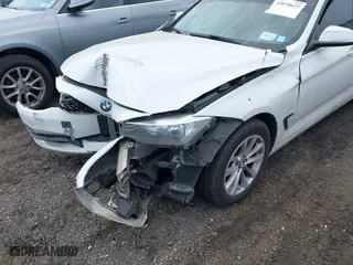 2014 BMW 3 Series Gran Turismo 328i xDrive with VIN WBA3X5C5XED559713, listed as a IAAI auction lot 42078622 with 68,233 mi miles. Bid and sale history available at carsss.com. Image 18.