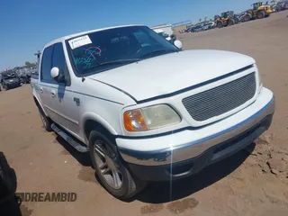 2001 Ford F-150 SuperCrew XLT with VIN 1FTRW07L51KC49955, listed as a IAAI auction lot 42035123 with 396,961 mi miles. Bid and sale history available at carsss.com. Image 1.