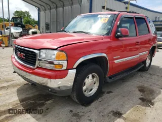 2000 GMC Yukon SLT with VIN 1GKEK13T6YJ107091, listed as a Copart auction lot 60345384 with 153,598 mi miles and Salvage Title. Bid and sale history available at carsss.com. Image 1.