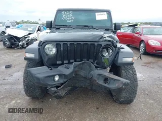 2022 Jeep Wrangler Unlimited Sport S z VIN 1C4HJXDG0NW133801, wystawiony jako IAAI lot #41908846 z przebiegiem 44 743 mil mil oraz . Historia ofert i sprzedaży dostępna na DreamBid. Obrazek 6.
