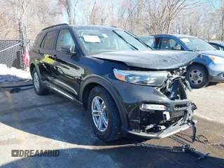 2023 Ford Explorer XLT with VIN 1FMSK8DHXPGB70042, listed as a IAAI auction lot 41429453 with 30,857 mi miles. Bid and sale history available at carsss.com. Image 1.