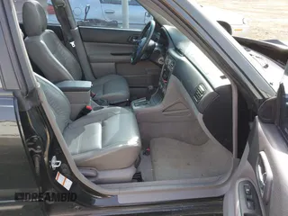 2003 Subaru Forester XS with VIN JF1SG65633H745258, listed as a IAAI auction lot 42014221 with 252,731 mi miles. Bid and sale history available at carsss.com. Image 5.