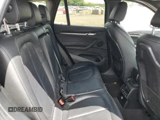 2018 BMW X1 xDrive28i with VIN WBXHT3C36J5F89230, listed as a Copart auction lot 62904545 with 170,860 mi miles and Salvage title. Bid and sale history available at DreamBid. Image 11.