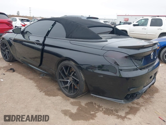 2014 BMW M6 z VIN WBSLZ9C58ED651156, wystawiony jako IAAI lot #41526192 z przebiegiem 90 642 mil mil oraz . Historia ofert i sprzedaży dostępna na DreamBid. Obrazek 3.