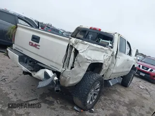 2014 GMC Sierra 1500 Denali z VIN 3GTU2WEJ5EG492544, wystawiony jako IAAI lot #41644535 z przebiegiem 215 469 mil mil oraz . Historia ofert i sprzedaży dostępna na DreamBid. Obrazek 4.